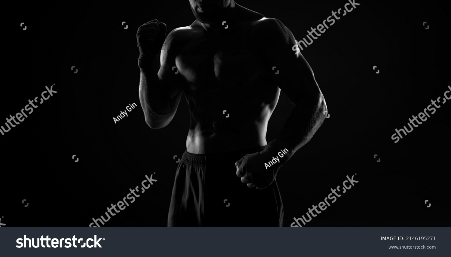 Noname image of a kickboxer on a dark background. The concept of mixed martial arts. MMA #2146195271