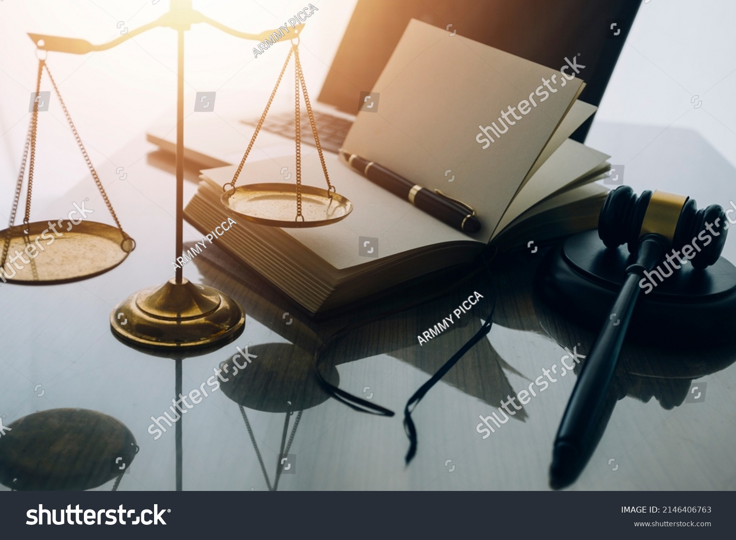 law books and scales of justice on desk in library of law firm. jurisprudence legal education concept. #2146406763