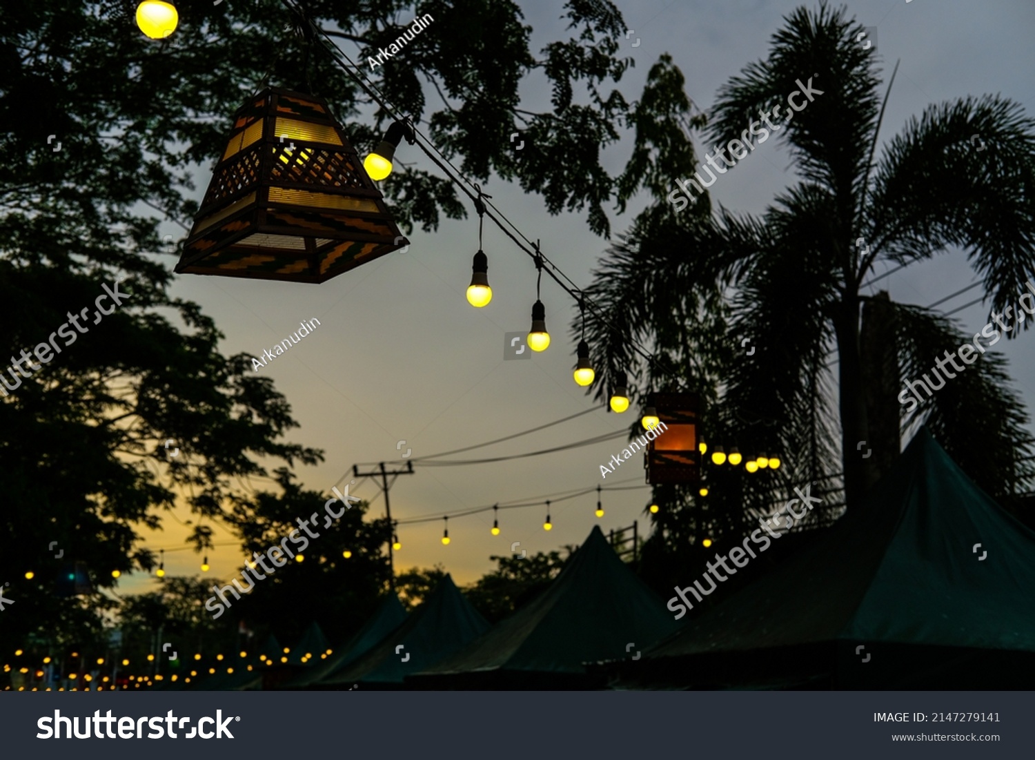 Decorative lights adorn Ramadan celebrations at sunset. #2147279141