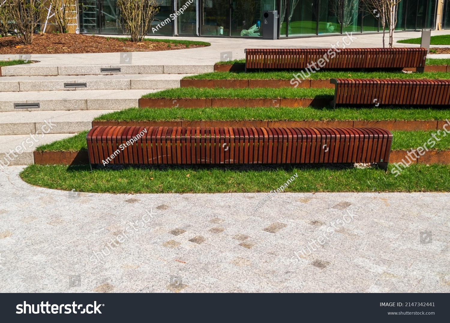 New modern bench in park. Outdoor city architecture, wooden benches, outdoor chair, urban public furniture, empty plank seat, comfortable bench in recreation area #2147342441