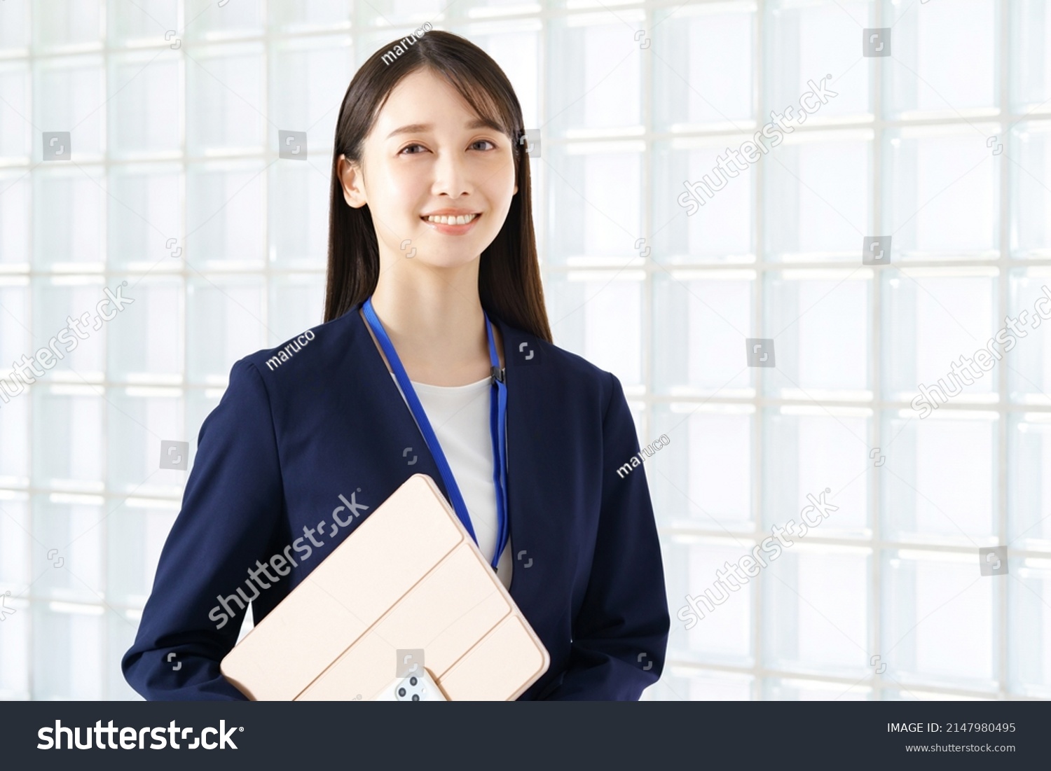 Young woman in a suit #2147980495