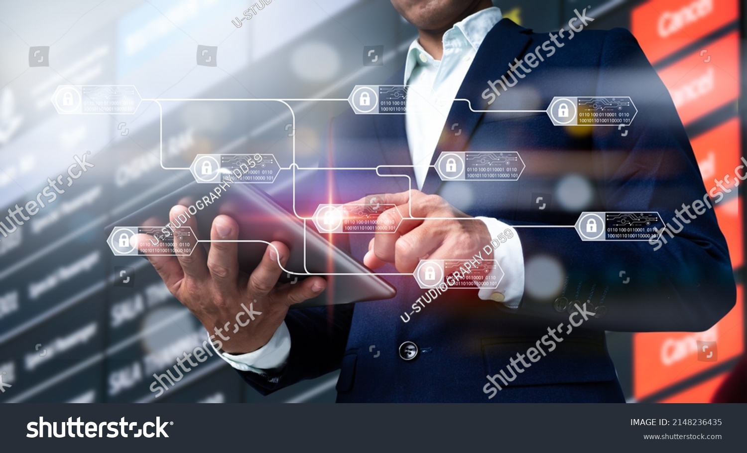A chain diagram and encrypted blocks are used to demonstrate the blockchain technology idea. A businessman's hand holding a digital tablet, as well as a business plan and social media diagram. #2148236435