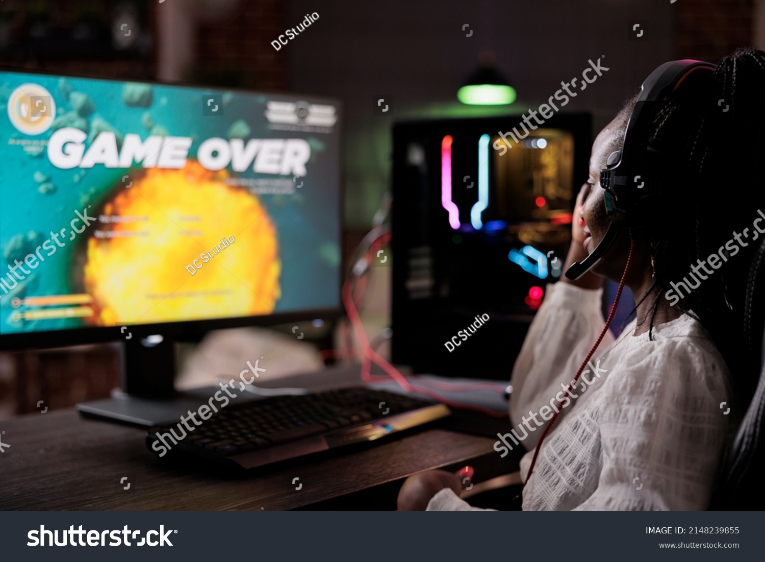 Frustrated streamer losing action video games competition play, using pc to stream gaming tournament. Female gamer feeling sad about lost online rpg multiplayer gameplay championship. #2148239855