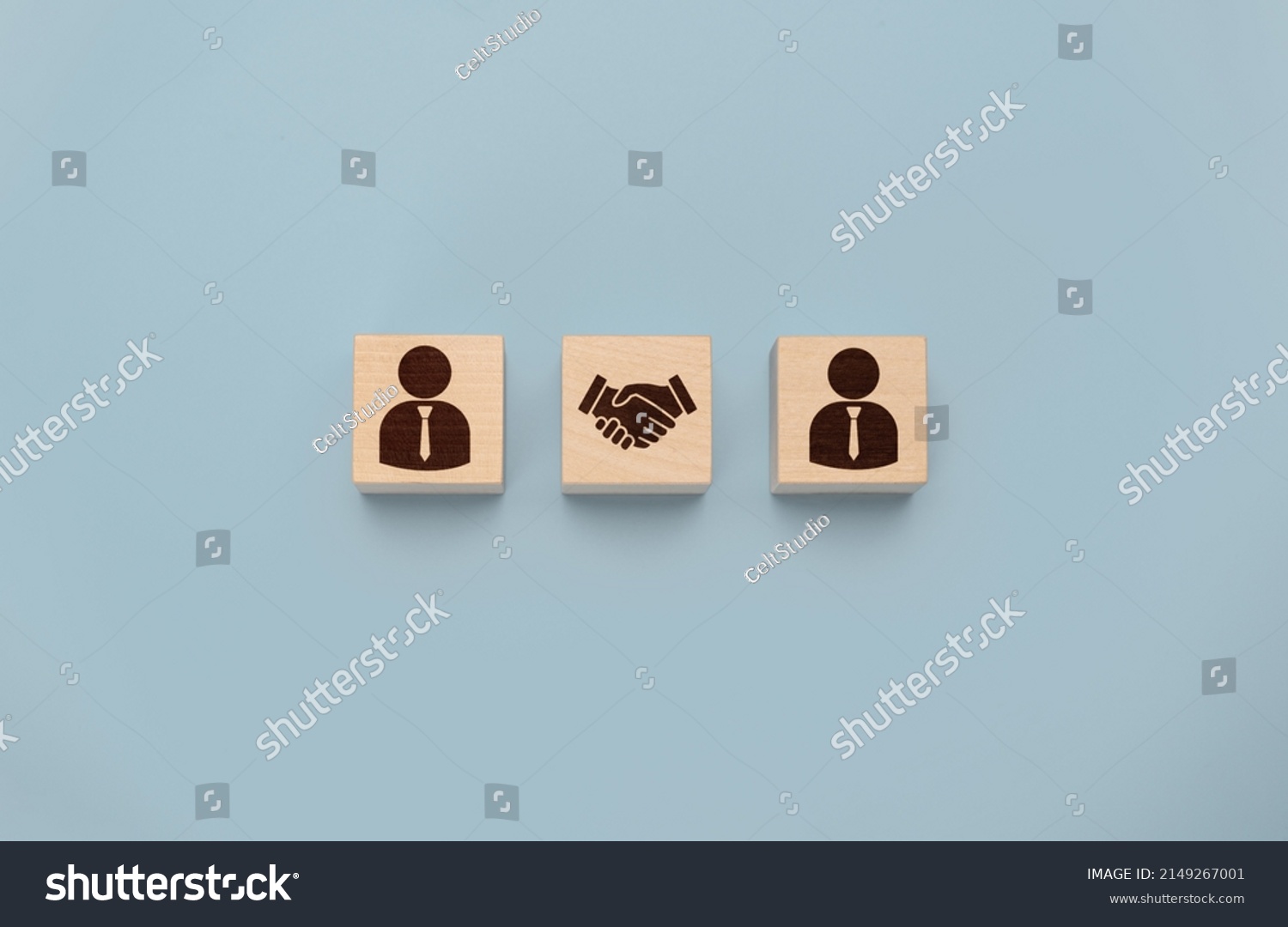 business contract. Hand putting hand shaking which print screen on wooden cube block in front of human icon for business deal and agreement concept. Teamwork process of partner and best relationship. #2149267001