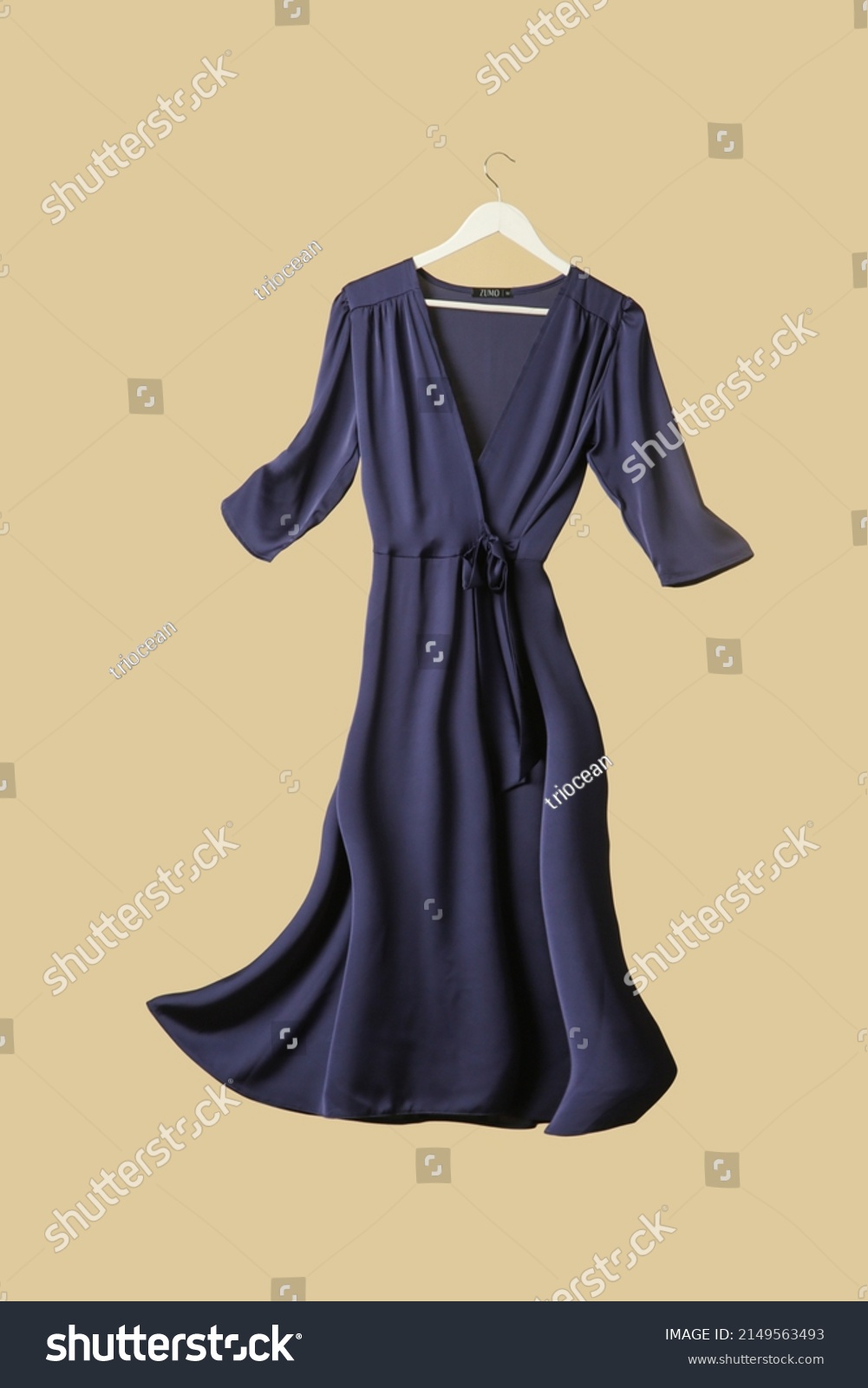 Studio shot of floating blue wrap dress #2149563493