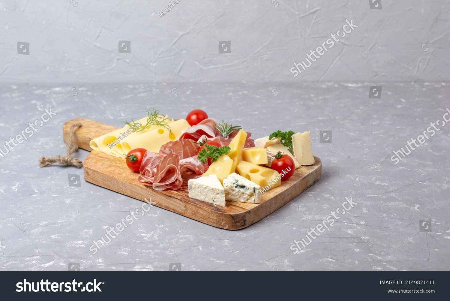 Appetizers table with differents antipasti, charcuterie, snacks and cheese. Buffet party. Top view, copy space, negative space #2149821411