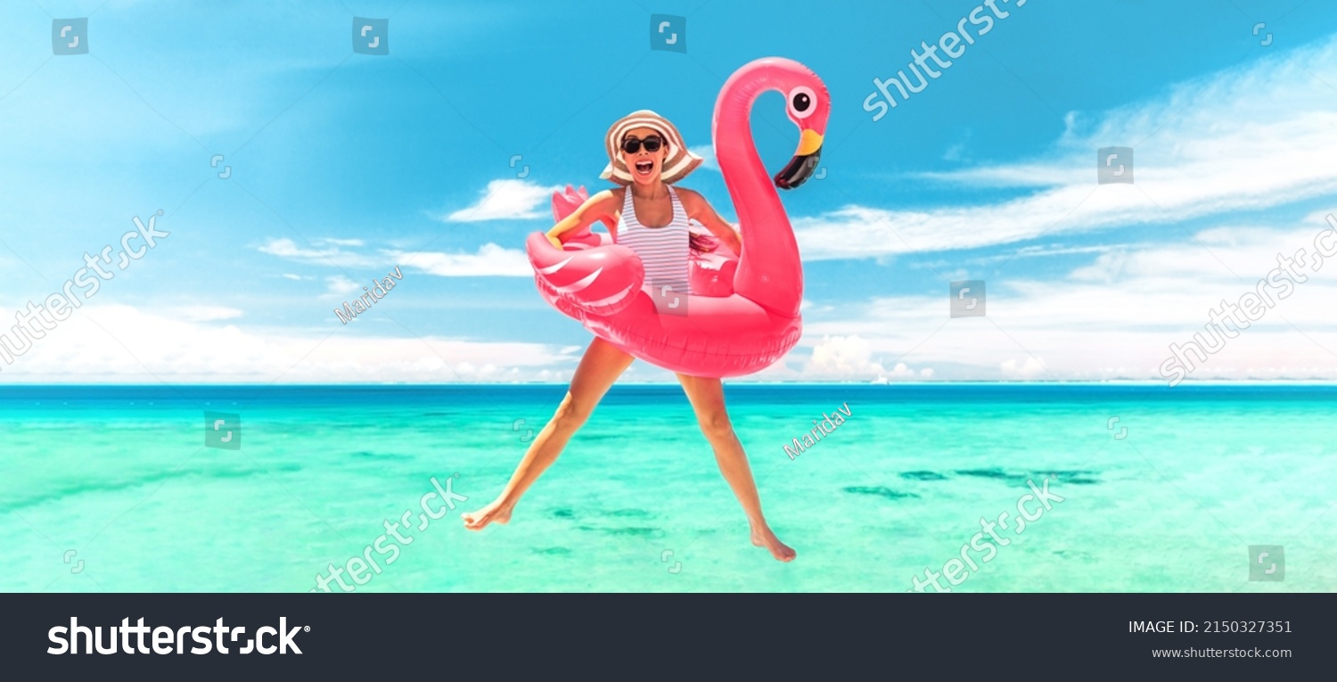 Vacation beach woman jumping of joy with pink flamingo pool float for summer holidays on ocean banner background. Fun travel excited girl for luxury Caribbean holiday panoramic. #2150327351