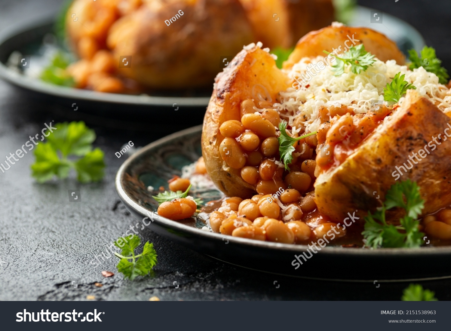 Jacket Baked potato with tomato beans, cheddar cheese. Traditional British food. #2151538963