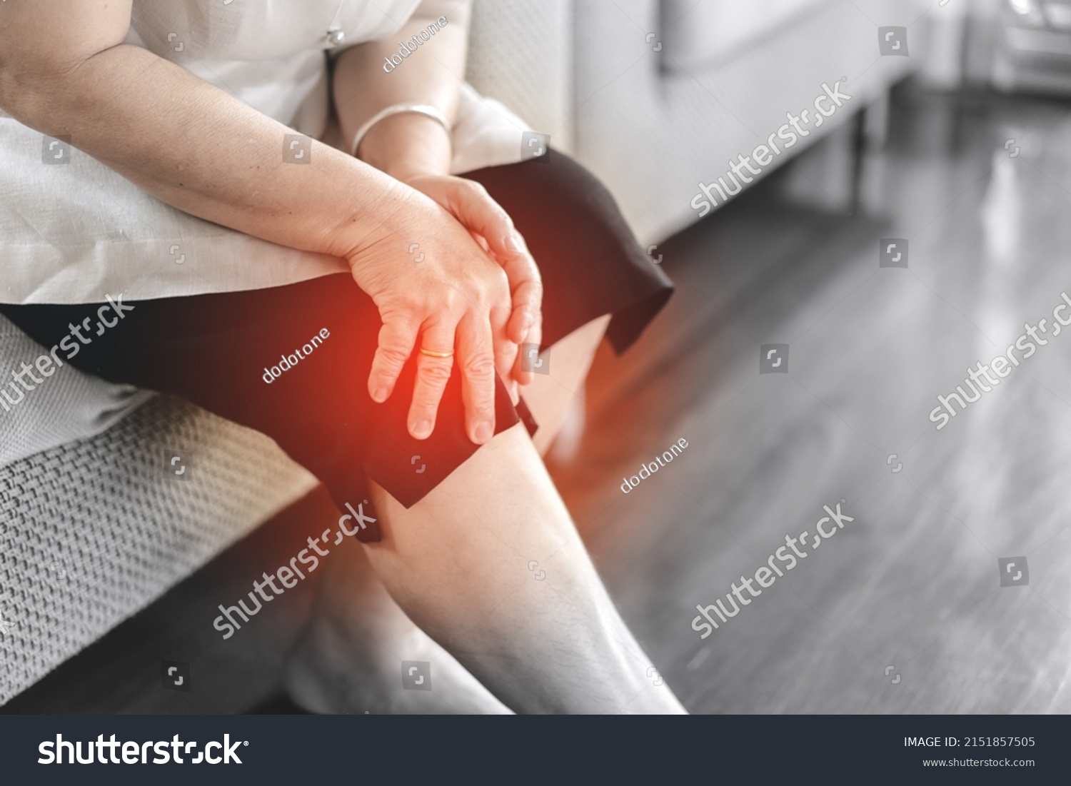 Old people stay alone at home has injury concept. Asian elderly woman has knee osteoarthritis pain. #2151857505
