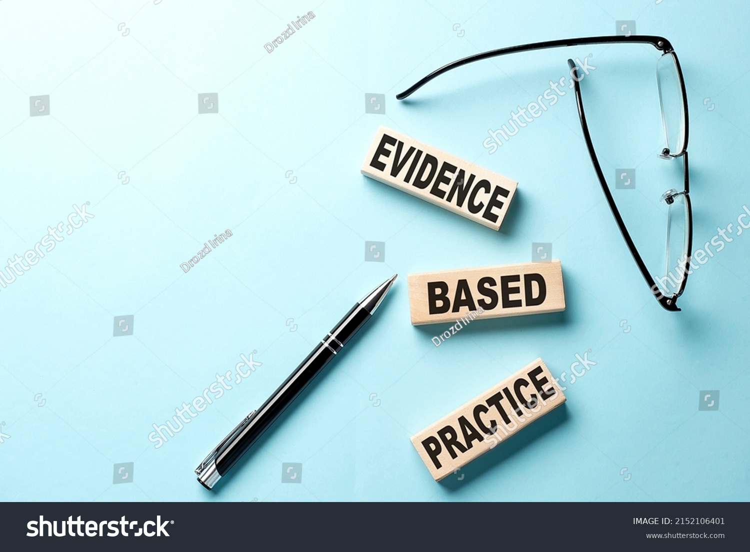 Text EBP Evidence-based practice concept on wooden block on blue background #2152106401