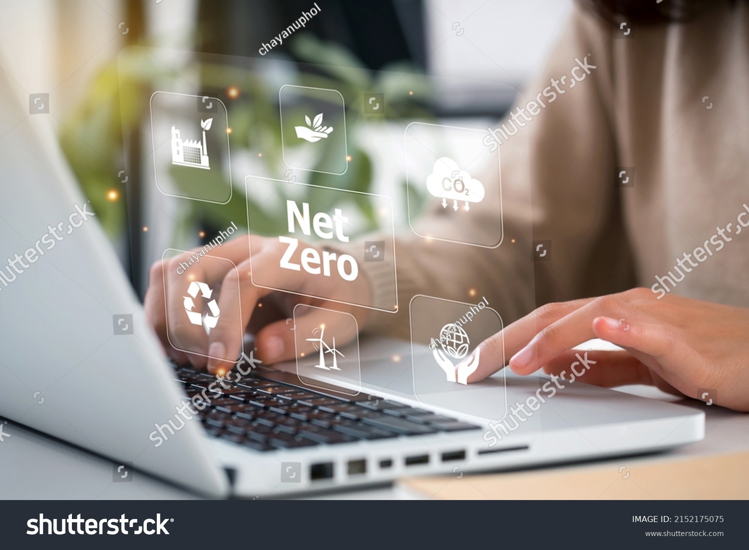 women hand using laptop for working technology and business 
Net zero and carbon neutral concept.NET ZERO icons and symbols save the eco world and reduce pollution. greenhouse gas emissions target.  #2152175075
