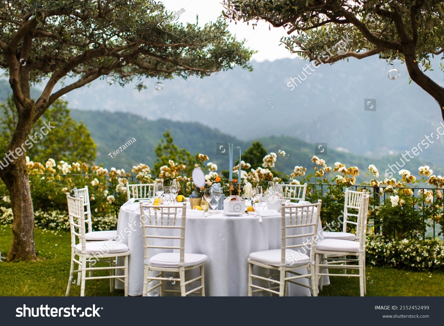 Table set for wedding or another catered event dinner in the garden #2152452499