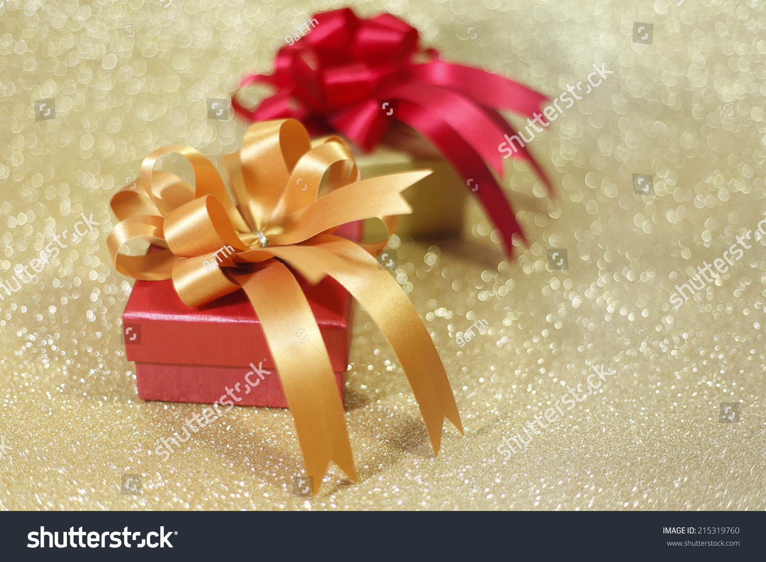 Christmas gift on Decorative background in gold.; #215319760