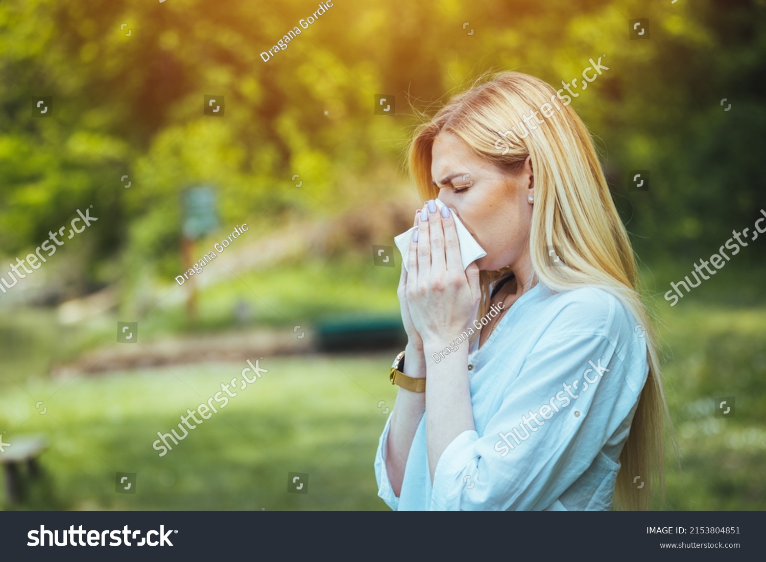 Woman Blowing Her Nose With Handkerchief In Public Parkf. Seasonal Virus Infection. Chronic Disease Control, Allergy Induced Asthma Remedy And Chronic Pulmonary Disease Concept. #2153804851