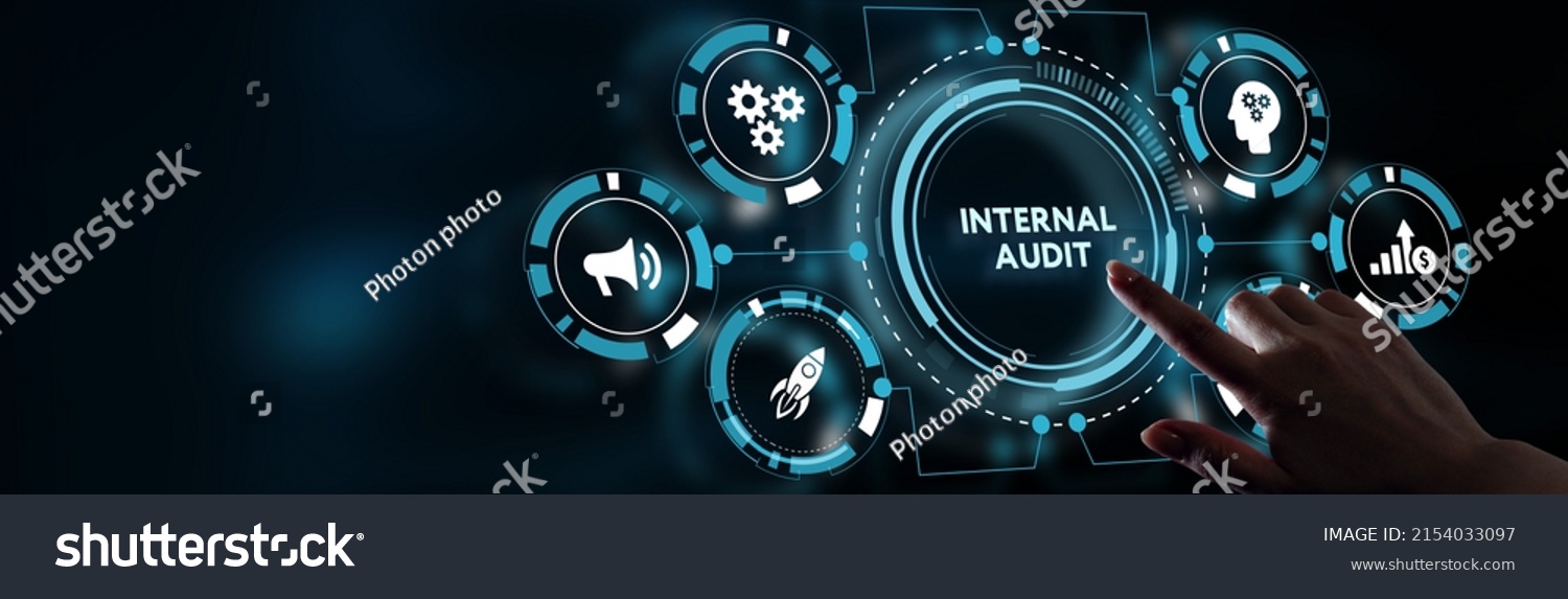 Business, Technology, Internet and network concept. Young businessman working on a virtual screen of the future and sees the inscription: Internal audit #2154033097