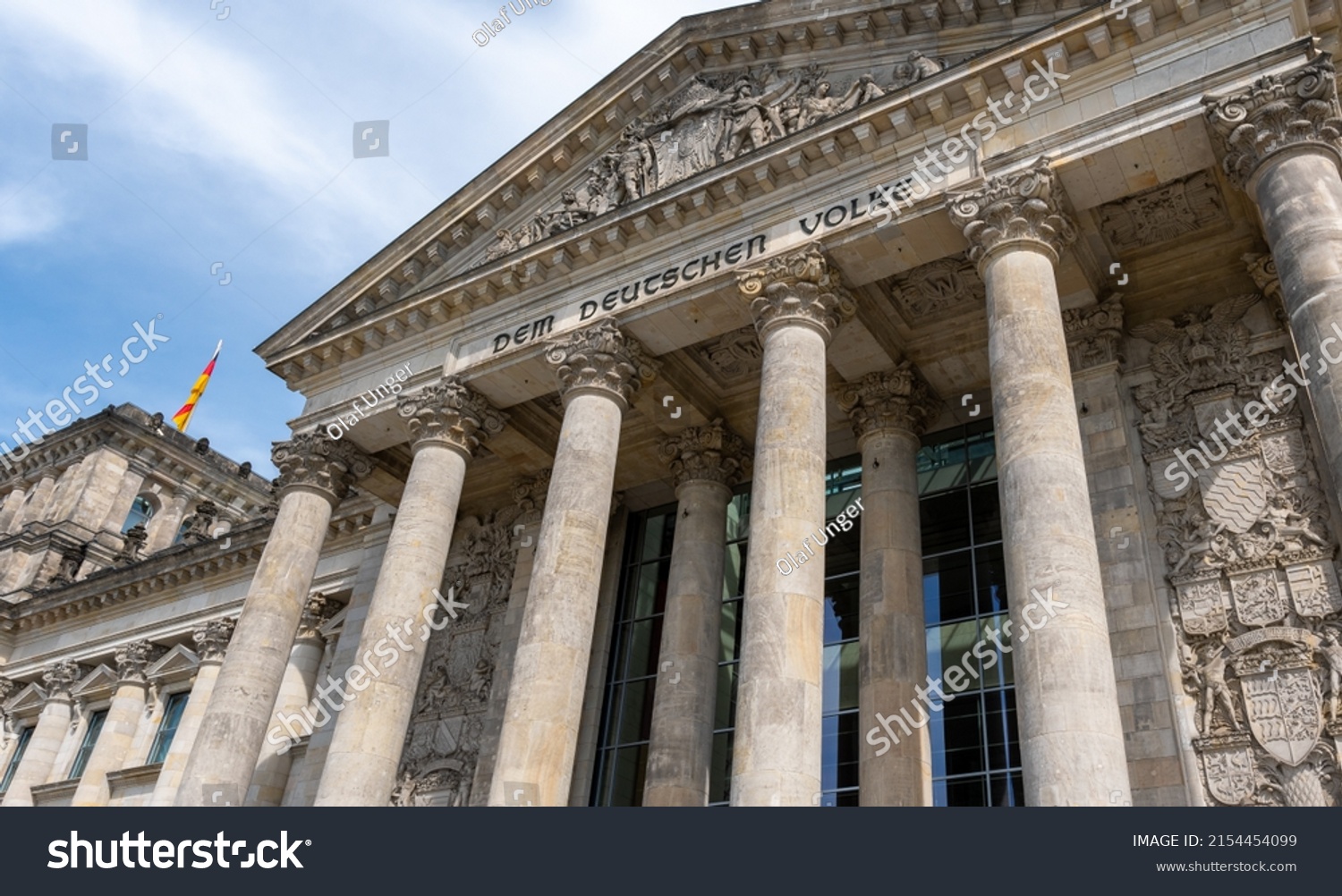 The Reichstag building (Bundestag) in Berlin, Germany, meeting place of the German parliament: The inscription says: Dem Deutschen Volke - To the German people #2154454099