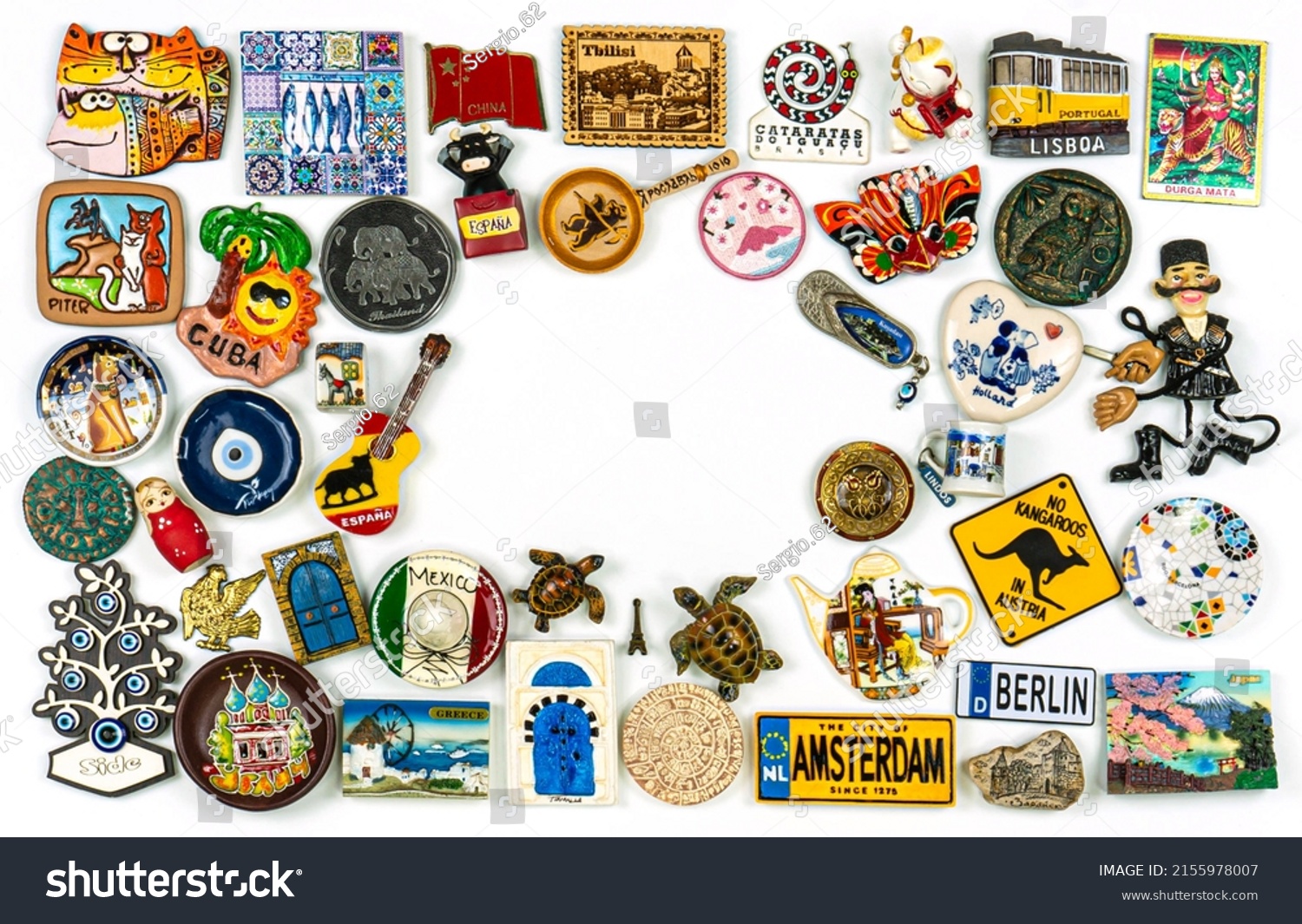Travel souvenirs From Around The World On A White Background. Fridge magnets. Landscape orientation with window. #2155978007