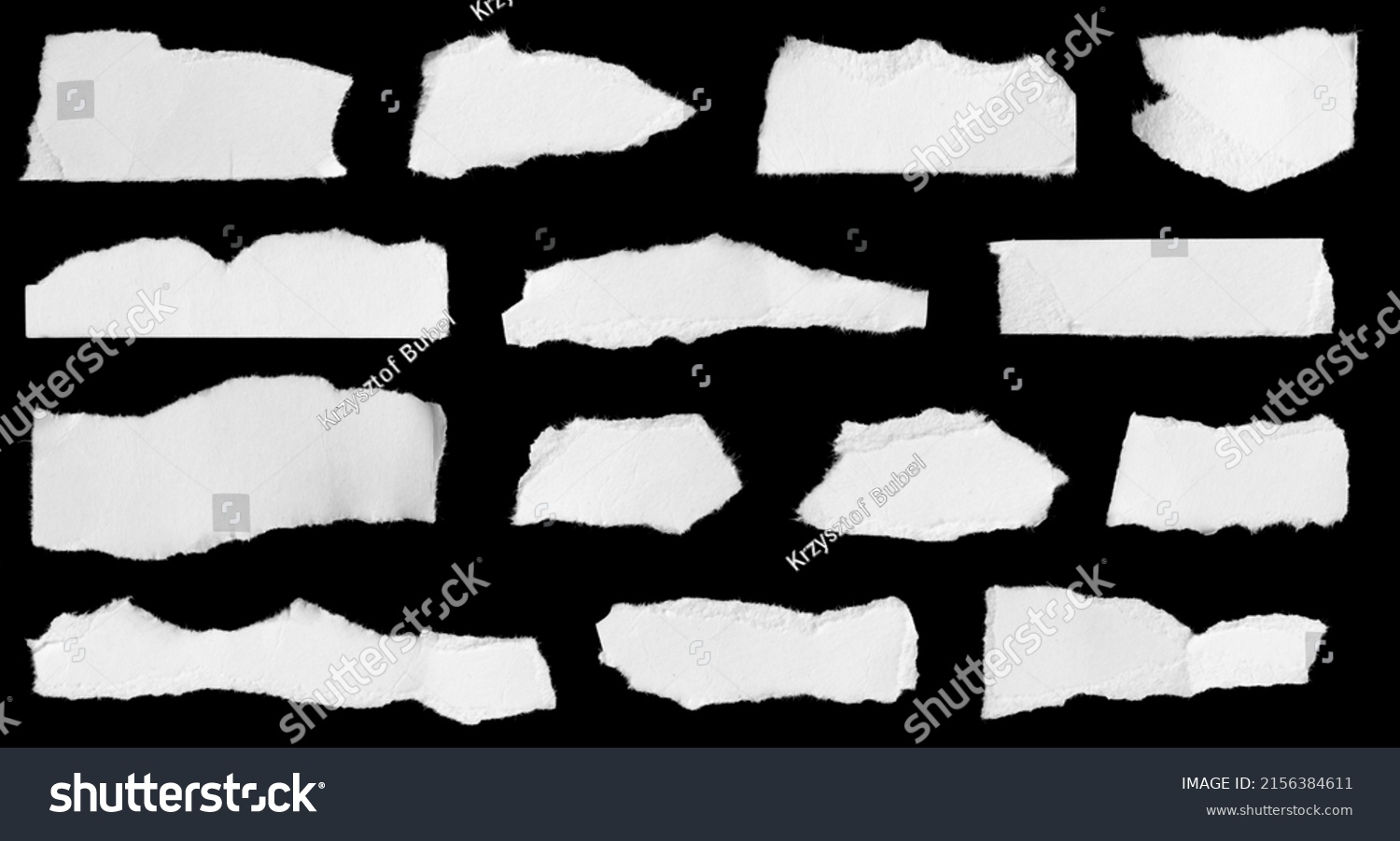 a white piece of paper on a black isolated background #2156384611