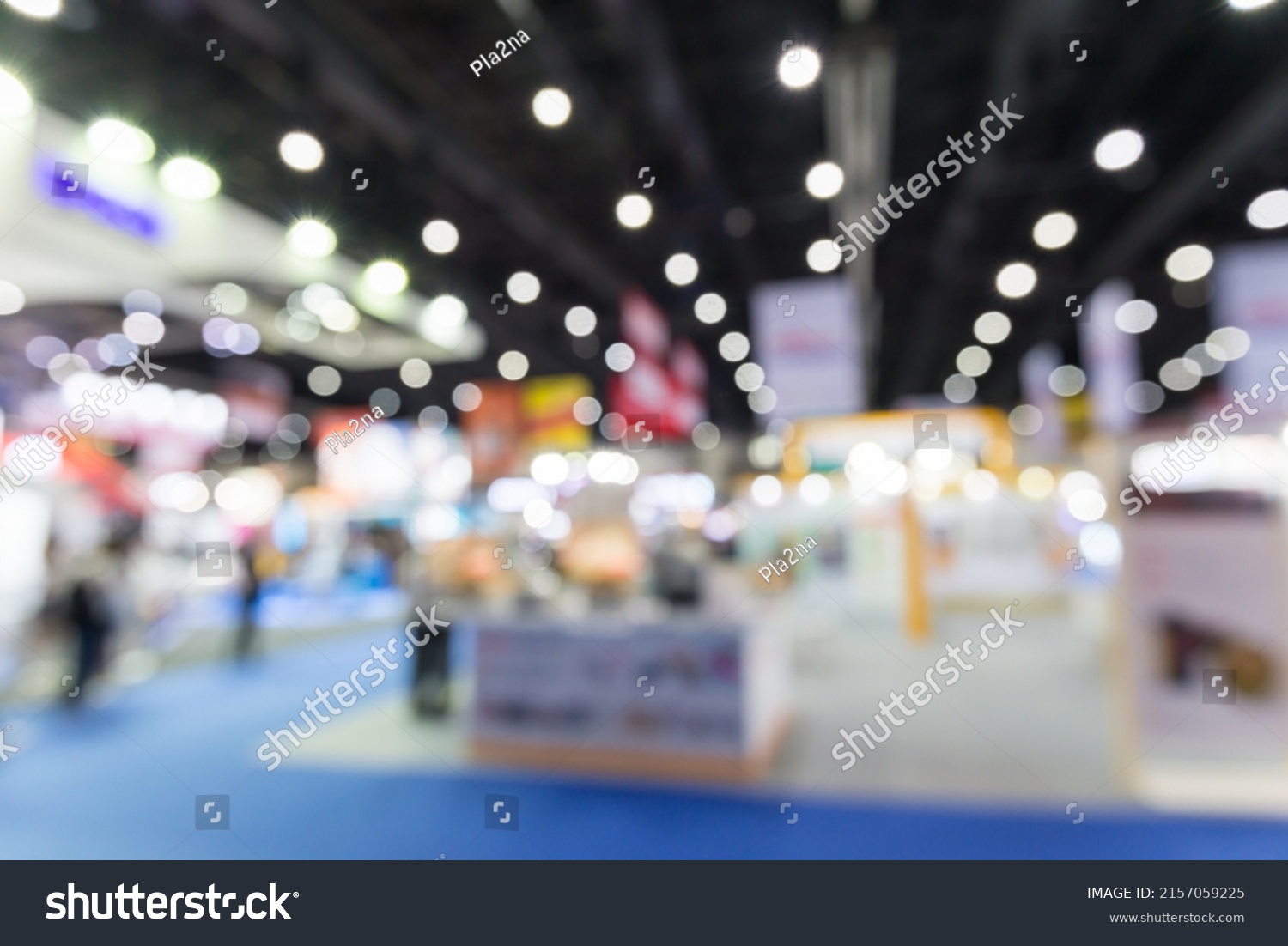 Abstract blur people in exhibition hall event trade show expo background. Large international exhibition, convention center, Business marketing and MICE industry concept. #2157059225