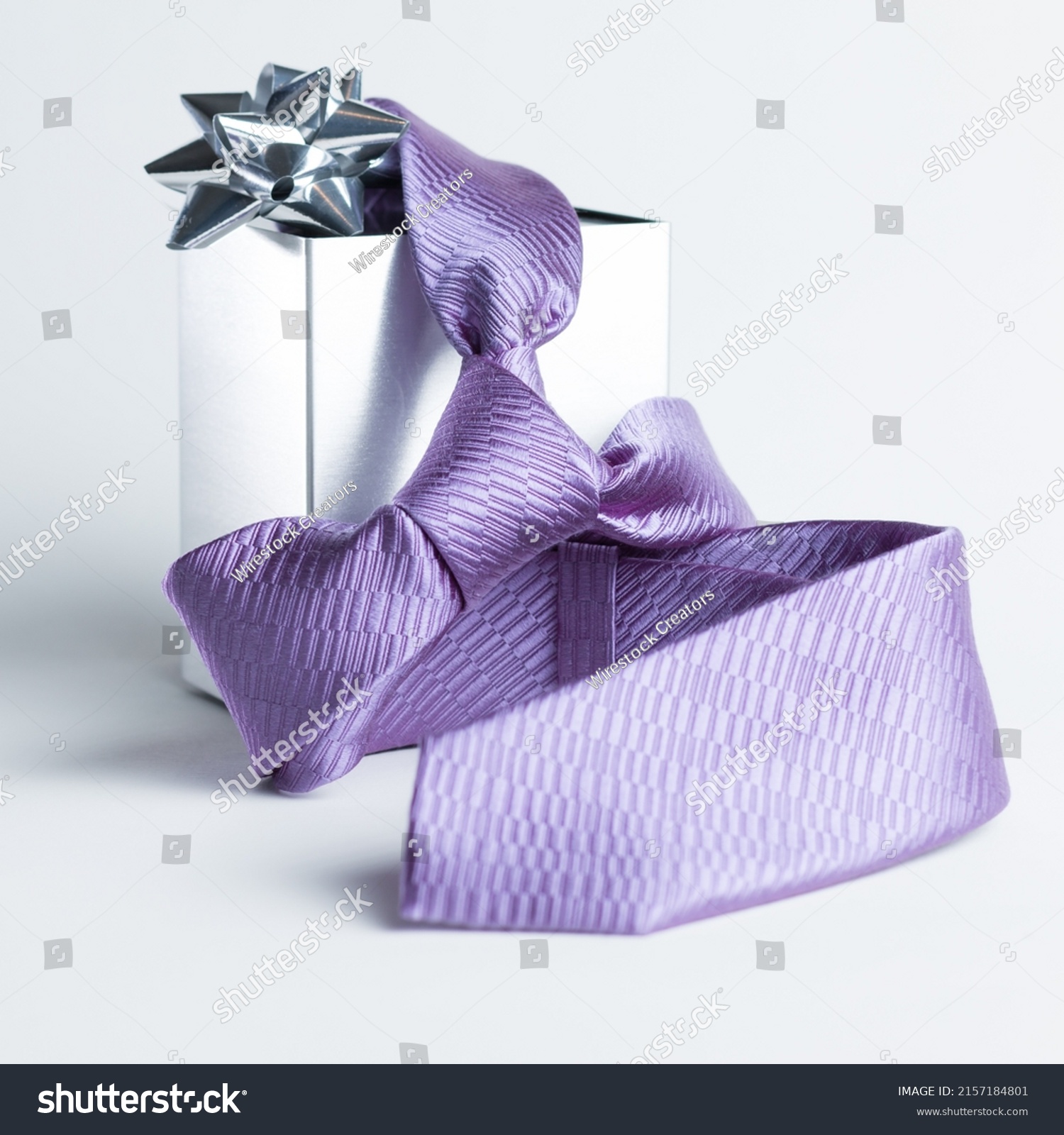 The representation of Father's Day with still life - tie and gift box #2157184801