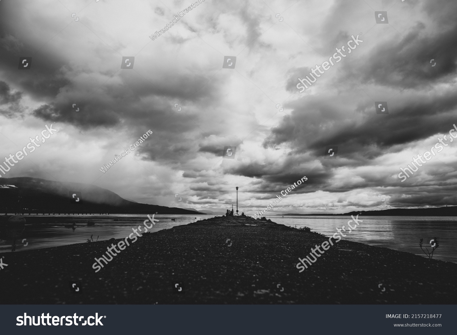 A grayscale shot of cloudscape above the lake  #2157218477