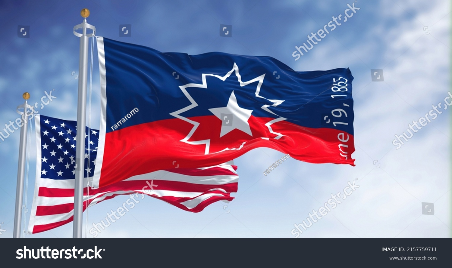 The Juneteenth flag waving in the wind with the american flag. Juneteenth is a federal holiday in the United States commemorating the emancipation of enslaved African-Americans #2157759711