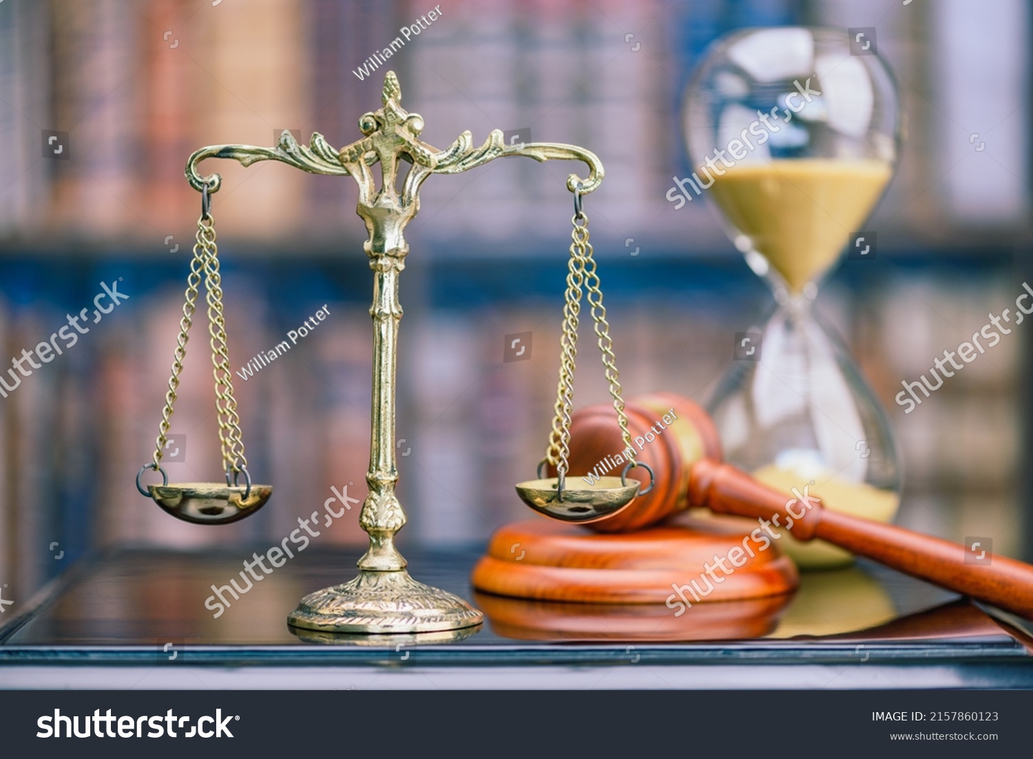 Legal office of lawyers, justice and law concept : Retro balance scale of justice on a desk in a courtroom, depicting giving fair and objective consideration to all evidence, without showing bias. #2157860123