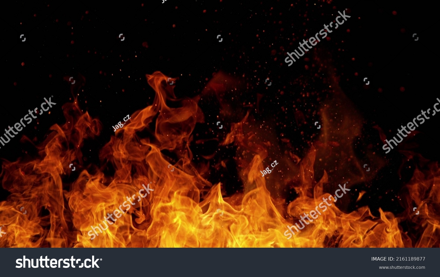 Fire abstract background with flames and copyspace. Isolated on black background. #2161189877