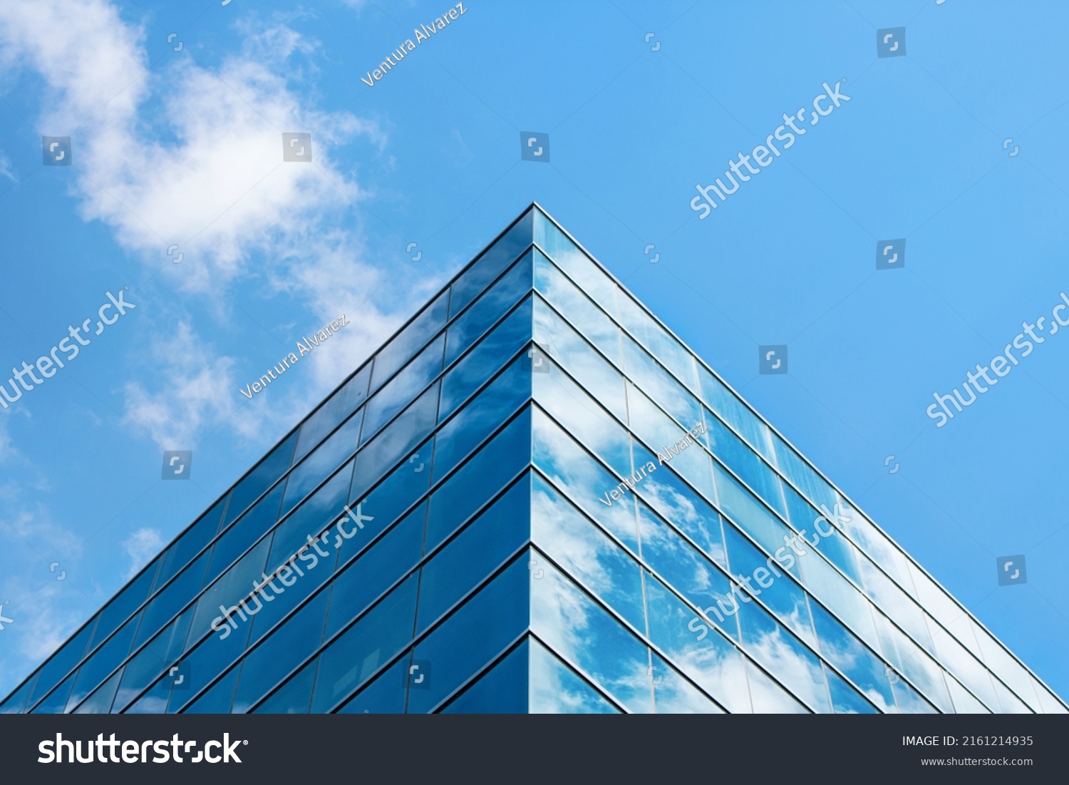 Office buildingfacade. Close up of a modern glass building #2161214935