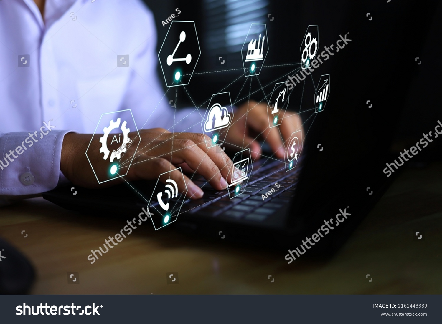 Businessman planning or working on a laptop with industrial icon connected business such as manufacturing, investment, cost, income, market analysis, maintenance, big data hybrid cloud, ai compliance. #2161443339