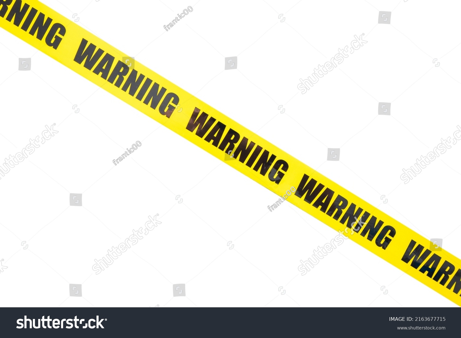 Yellow warning tape isolated and cutout on white background. Risk and accident concept #2163677715