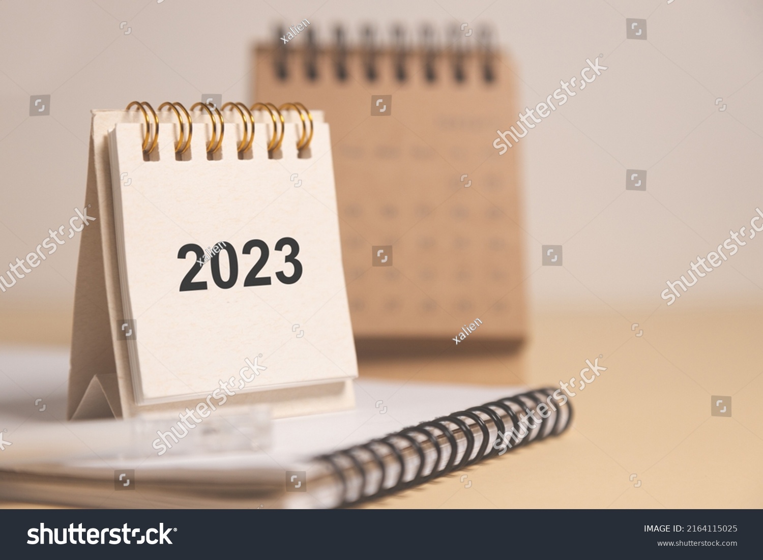 Desktop calendar for 2023 on a beige background. goals and plans on next year. #2164115025