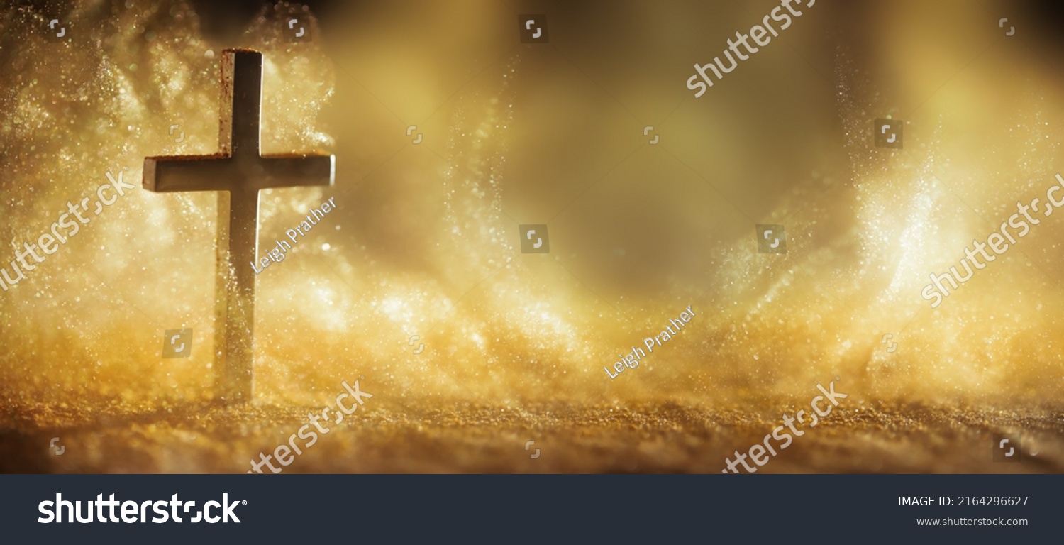 Religious cross in abstract wallpaper with shining gold sparkles and radiant lights. Symbolism of heaven or the resurrection. #2164296627