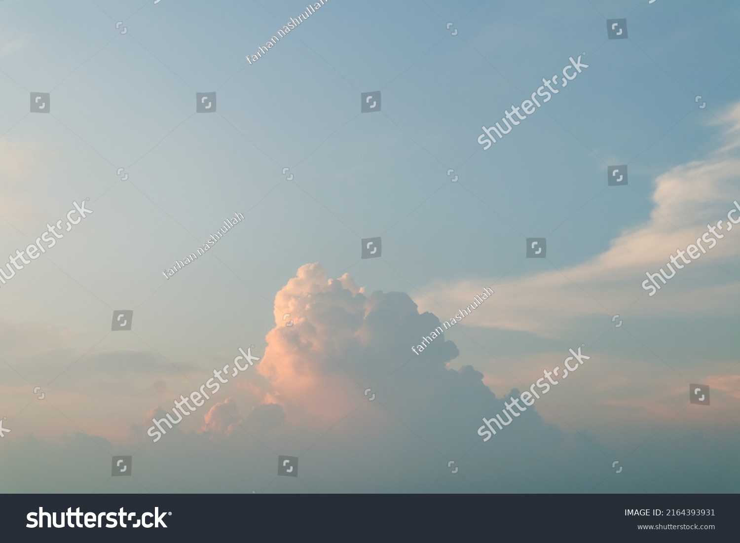 the sky is blue with reddish clouds at sunset
 #2164393931