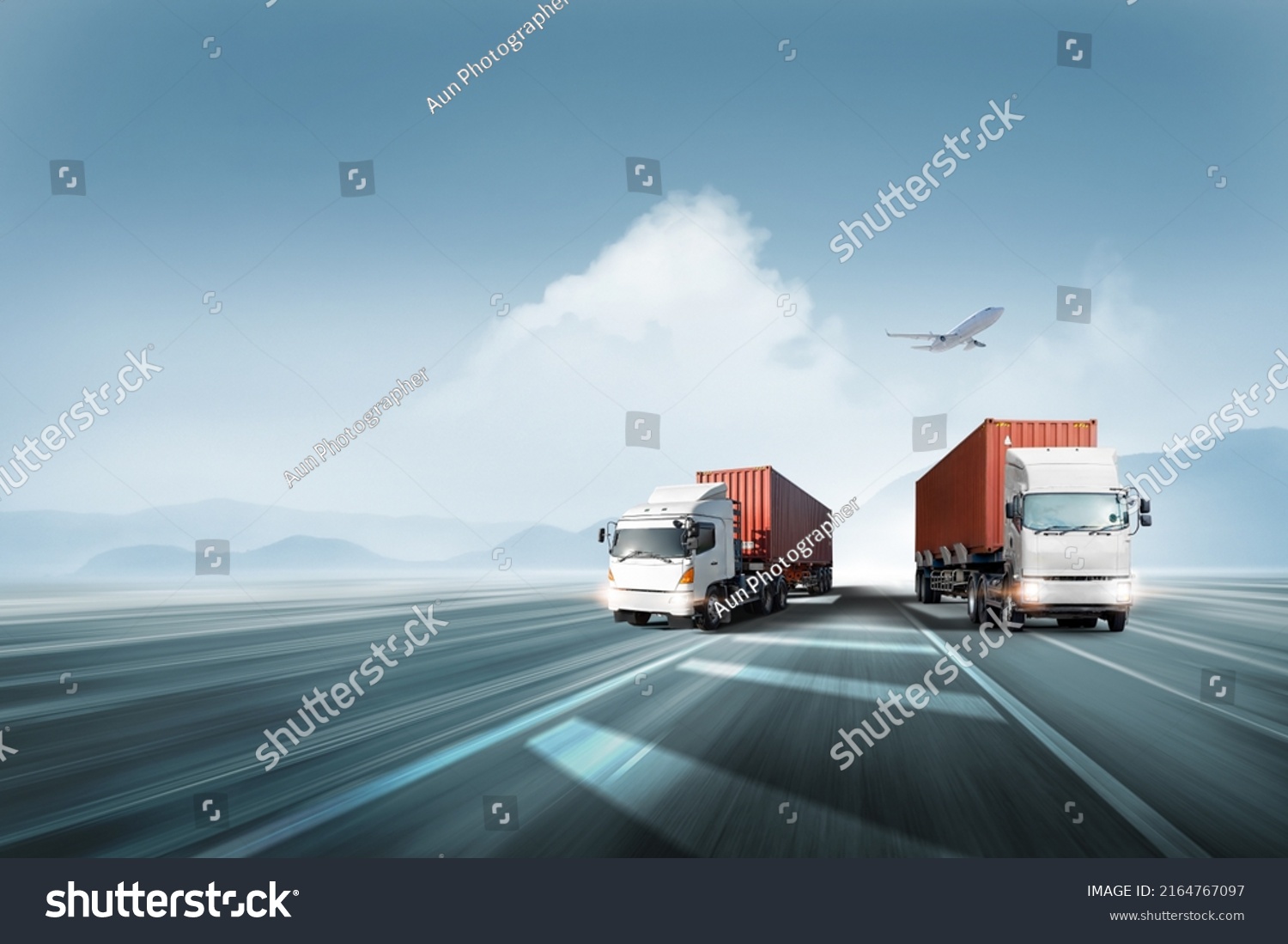Logistics import export and cargo transportation industry concept of Container Truck run on highway road at sunset blue sky background with copy space, cargo airplane, moving by motion blur effect #2164767097