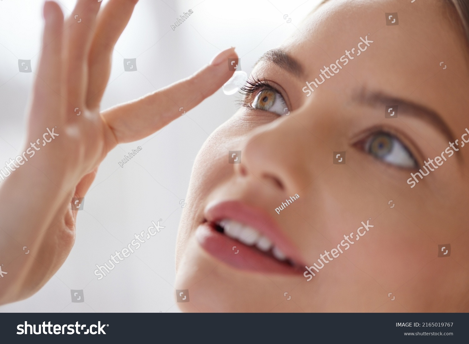 Eye care. Smiling Woman With Contact Lens on Finger Closeup. Smiling Lady with Contact Eye Lenses in Hand. Girl Applying Eye Contacts. Eye Health Care Concept #2165019767
