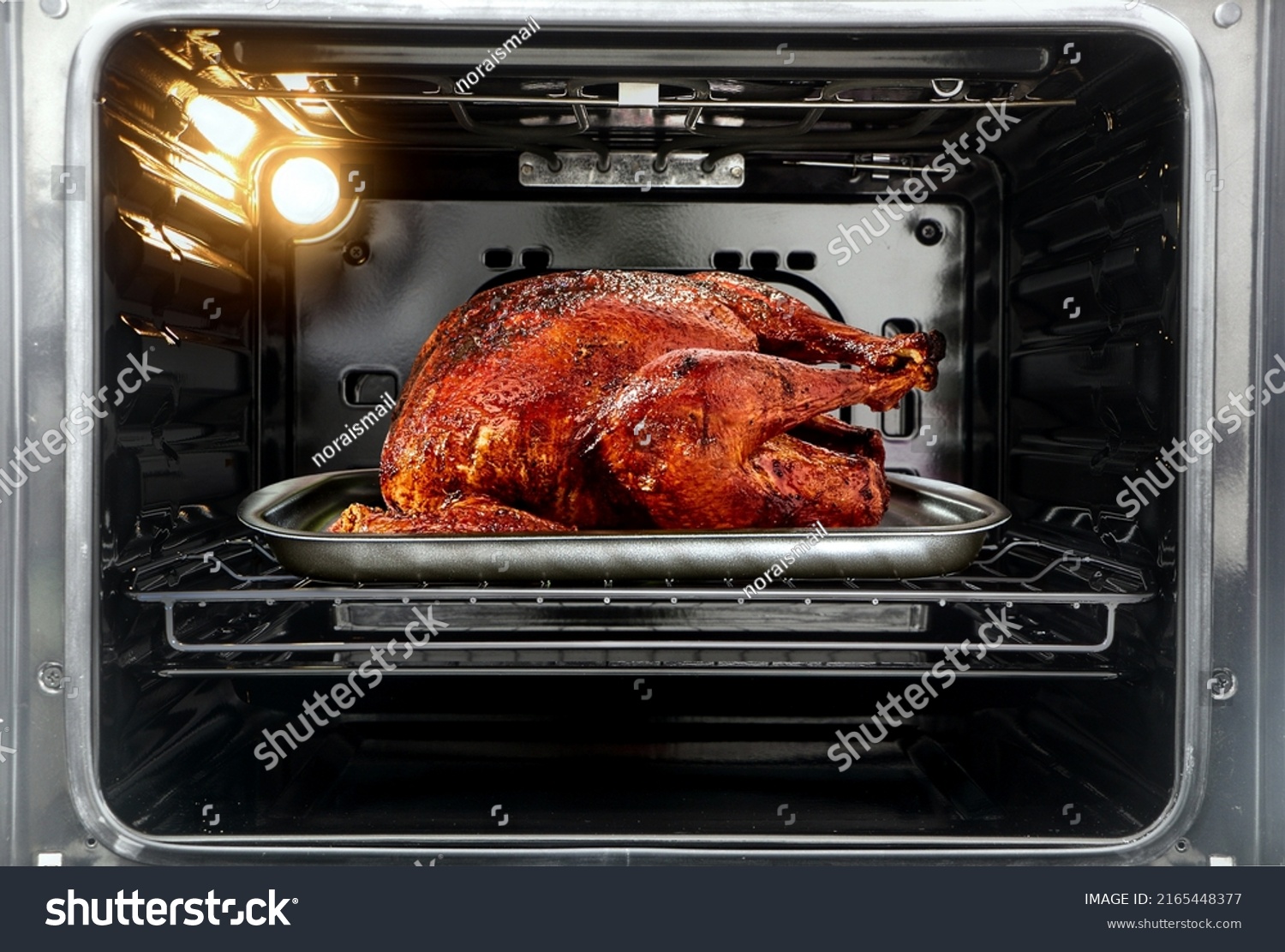 Whole roast turkey in the oven #2165448377