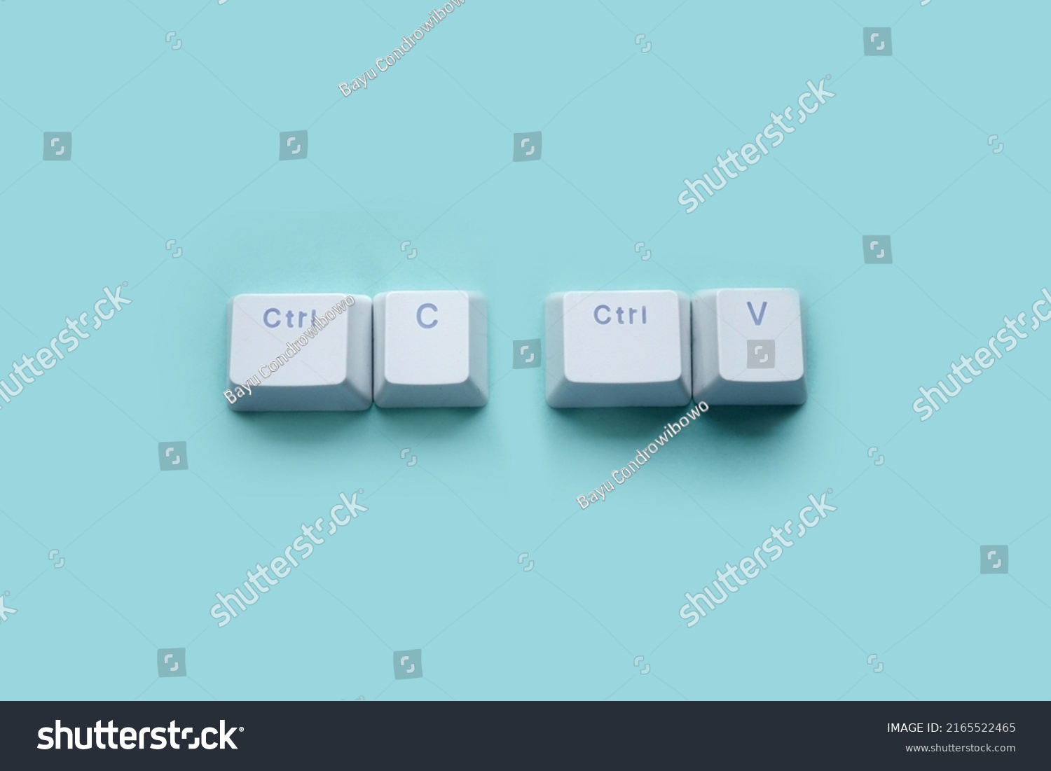 Ctrl C, Ctrl V keyboard buttons, copy and paste key shortcut isolated on a blue background. #2165522465