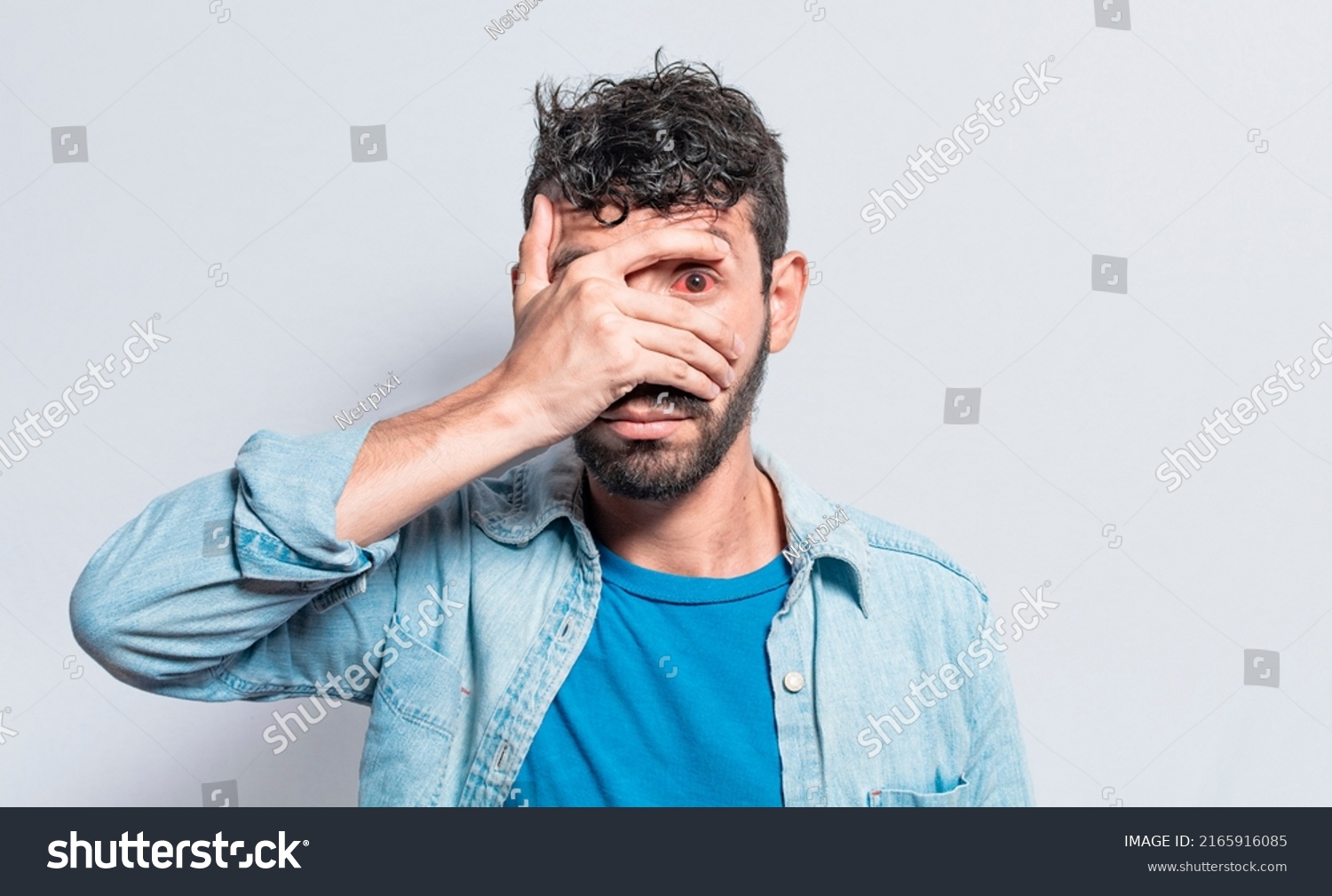 Person with irritated eyes. People with eye pain on isolated background, Person with conjunctivitis on isolated background, Close up of people with eye strain, man with irritated eye #2165916085
