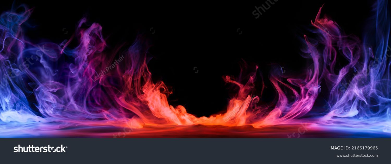 Dramatic smoke and fog in contrasting vivid red, blue, and purple colors. Vivid and intense abstract background or wallpaper. #2166179965