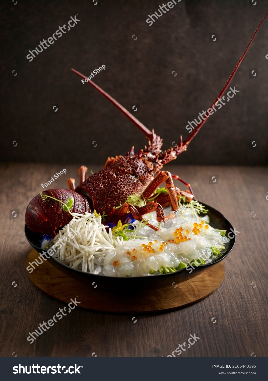 Sashimi Australian Lobster served in a dish side view on dark background #2166440395