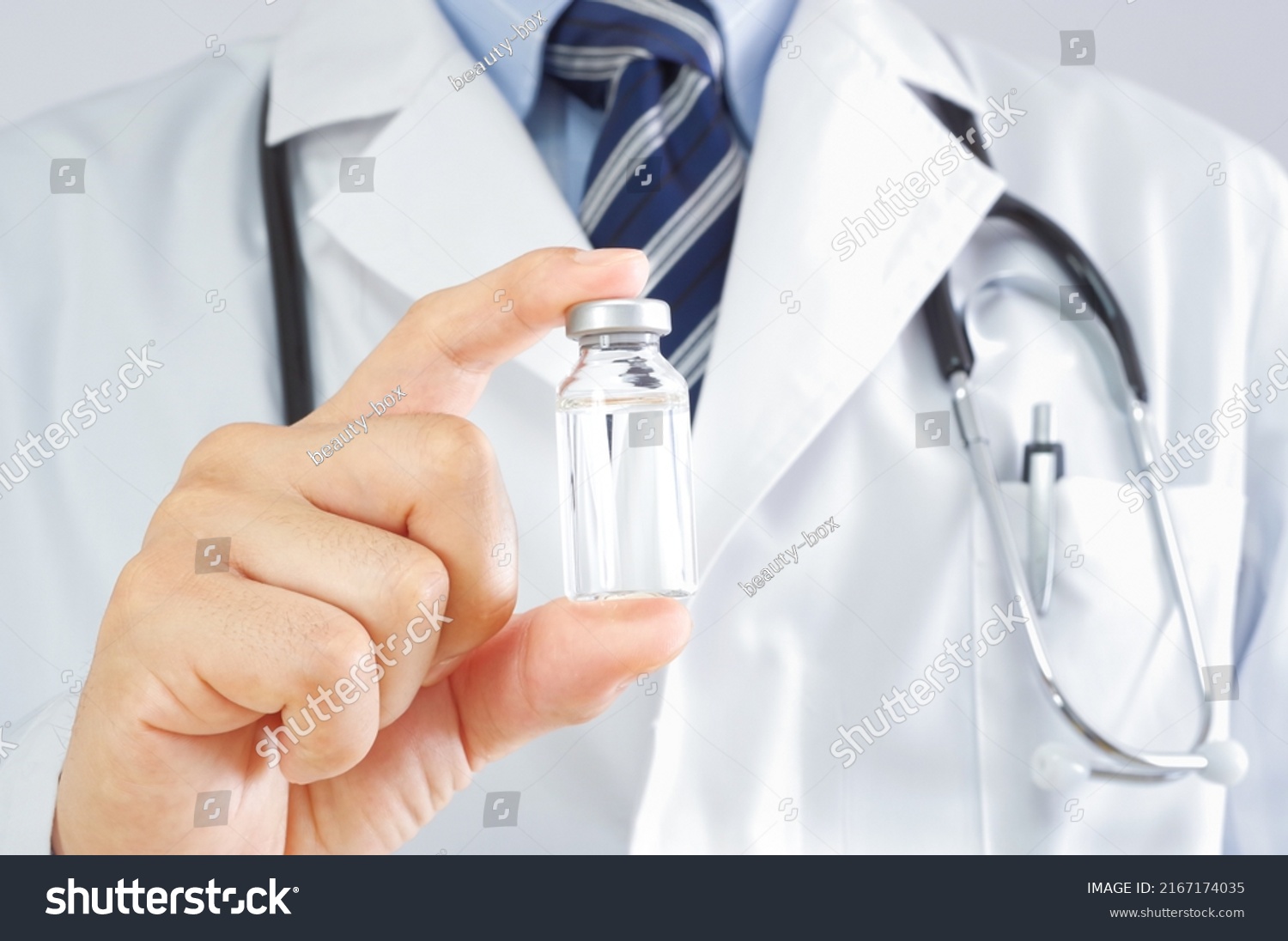 A Japanese doctor with a vial bottle #2167174035
