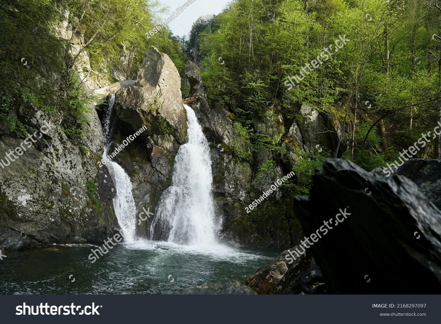 Rocks and boulders frame the majestic waterfall at Bash Bish Falls #2168297097