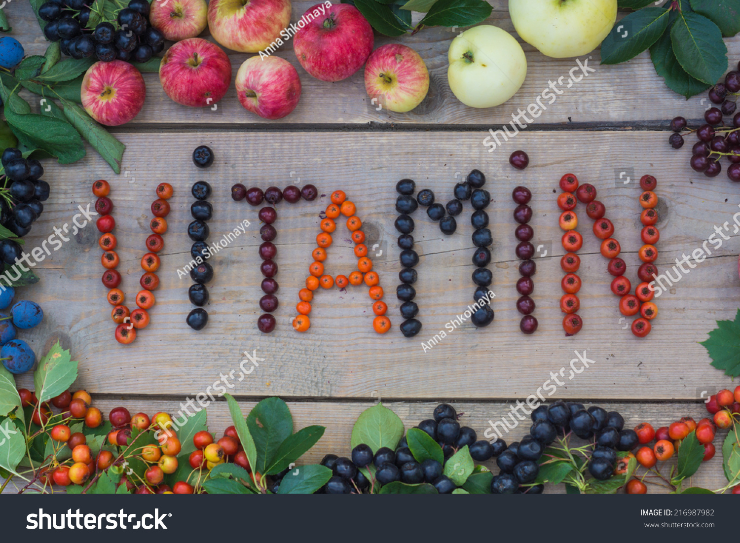 "Vitamin" word on a wooden background #216987982