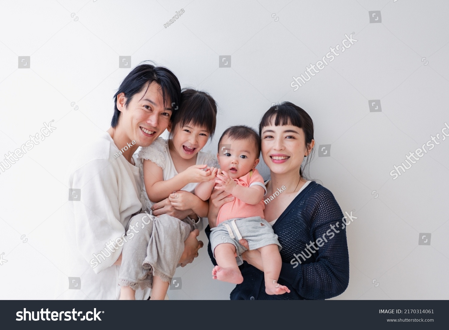 Family with babies in a group photo #2170314061