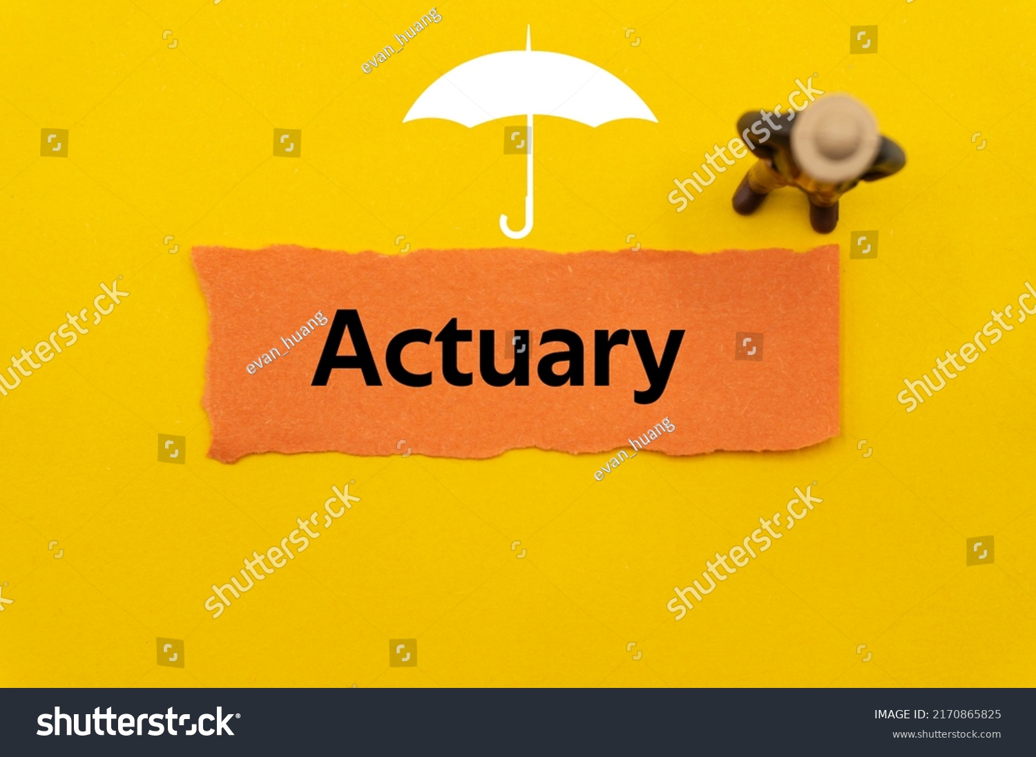 Actuary.The word is written on a slip of colored paper. Insurance terms, health care words, Life insurance terminology. business Buzzwords. #2170865825