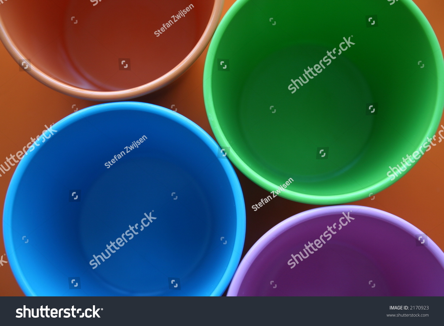 Top view of four colored plastic cups. #2170923