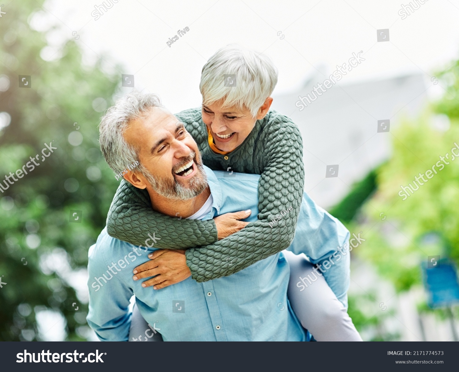 Happy active senior couple outdoors #2171774573