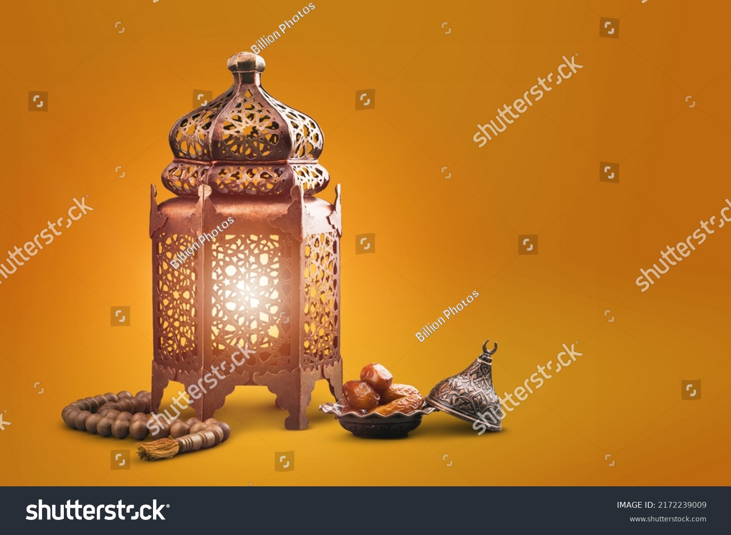 Fawanis. Traditional Ramadan lantern with prayer beads on background. #2172239009