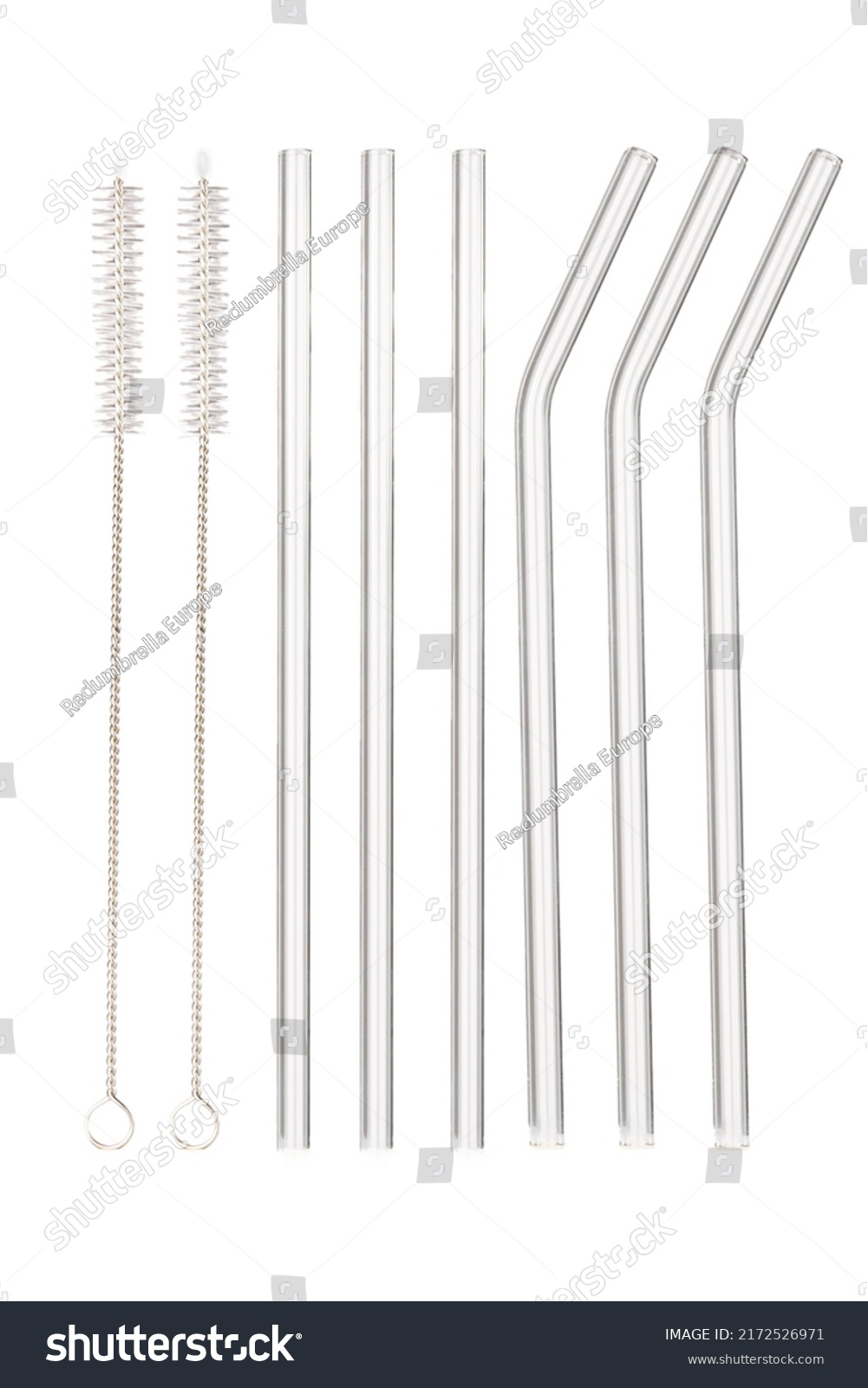 Close up shot of pack of six glass reusable straws. There are three straight straws and three curved straws, two cleaning brushes are isolated on white background. Front view. #2172526971